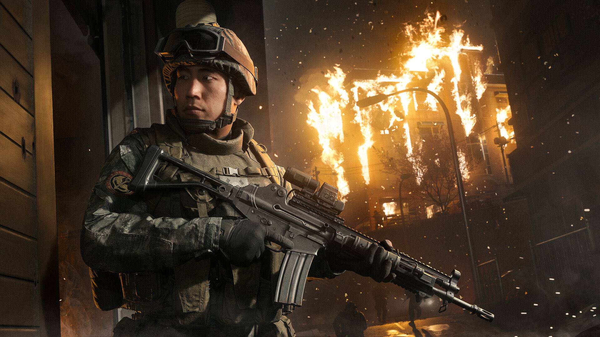 A soldier outside a burning building in Modern Warfare 4